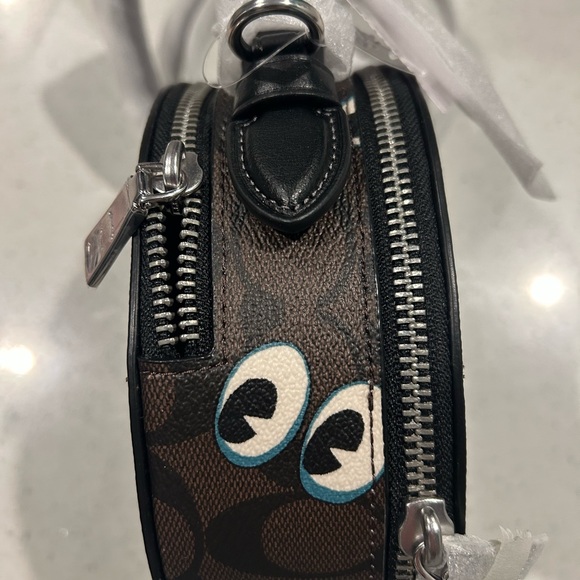 Coach Canteen Signature Canvas With Halloween Eyes
New with Tag - Picture 9 of 15